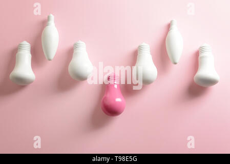 Painted light bulbs on color background Stock Photo
