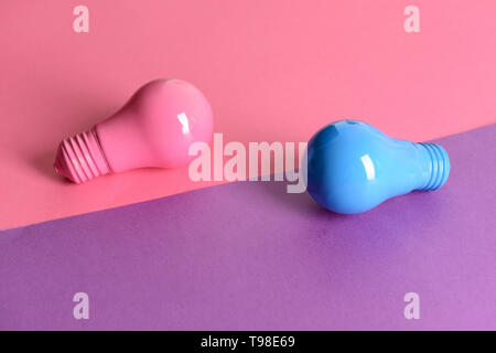 Painted light bulbs on color background Stock Photo
