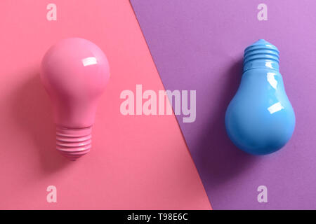 Painted light bulbs on color background Stock Photo
