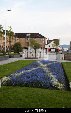Garden laid out with forget-me-nots in blue and white in the shape of the Scottish flag, or St Andrews Cross, Helensburgh, Scotland Stock Photo