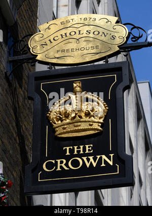 The Crown public house, Brewer Street, Soho, London, England, UK; hanging pub sign for Nicholson's pub Stock Photo