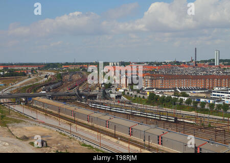 Copenhagen, Denmark - Jun 09, 2012: Railway tracks and city Stock Photo