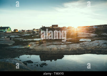 Village in Disko Bay at Midsummer, Greenland Stock Photo