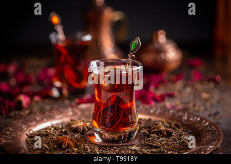 Close up of black tea in armudu tea glass Stock Photo