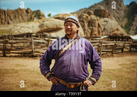 Nomad in traditional clothing, Mongolian Switzerland, Gobi Desert, Mongolia Stock Photo