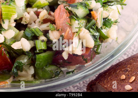 Salad Tabule - a common dish of Arabic cuisine. Stock Photo