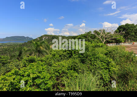 Panoramic view across lush green rural countryside, hills and lakes near Valle de Picadura, Mayabeque Province, Cuba Stock Photo