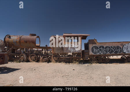 Train cemetery of abandoned locomotives, Uyuni, Bolivia Stock Photo