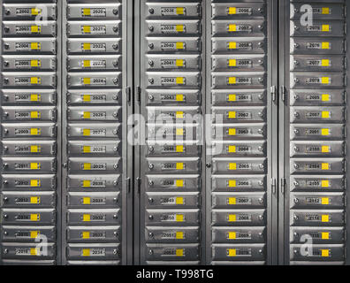 Rows of Metal Mail boxes and lock filled of numbers. Safe lockers, Safe deposit boxes. Concept of security, privacy and protection. Rows of Metal Mail boxes and lock filled of numbers. Safe lockers, Safe deposit boxes. Concept of security, privacy and protection.