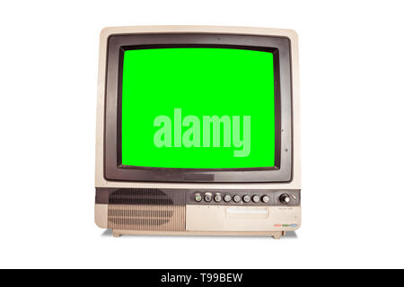 front view of old retro home TV receiver with blank green screen isolated on white background with clipping path