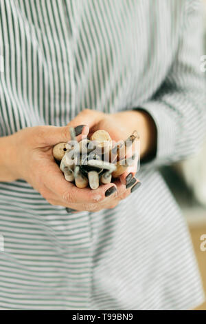 pottery tools for carving ceramic products in workshop Stock Photo