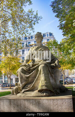 Allegory of peace. Mother with the sword sheathed and the child plays at her feet. Lyon, France Stock Photo