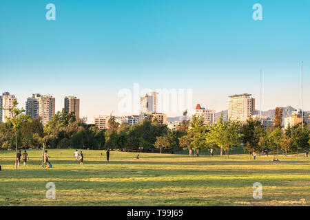 Santiago, Region Metropolitana, Chile - People enjoying a summer evening in Parque O’Higgins at downtown. Stock Photo