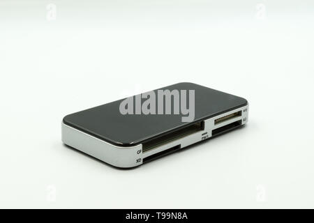 this is a capture of a black and silver multi port USB reader the picture is taken in a studio light and a white background Stock Photo