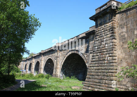 View along side of Lune Aqueduct, a Grade 1 listed building designed by John Rennie, as it carries the Lancaster Canal over the River Lune. Stock Photo