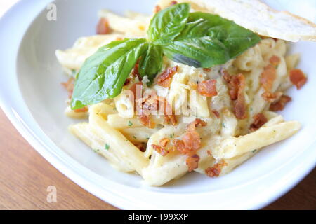 Spaghetti penne Carbonara Stock Photo - Alamy