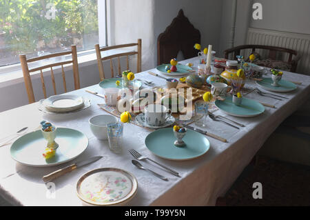 A table laid for Easter breakfast. Stock Photo