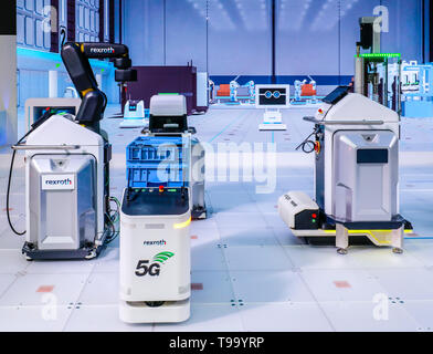 31.03.2019, Hannover, Lower Saxony, Germany - Hanover Fair, Industry 4.0, Factory of the Future at the Bosch Rexroth booth, 5G controls autonomous tra Stock Photo