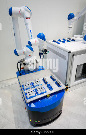 31.03.2019, Hannover, Lower Saxony, Germany - Hannover Fair, industrial robot at the Yaskawa booth, 5G controls autonomous transport systems. 00X19033 Stock Photo