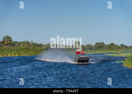 Girl Operating Airboat in Central Florida USA Stock Photo