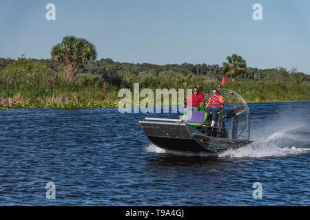 Girl Operating Airboat in Central Florida USA Stock Photo