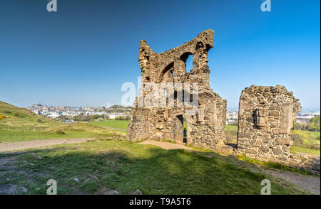 View over Edinburgh and the Saint Anthony's Chapel Ruins Stock Photo