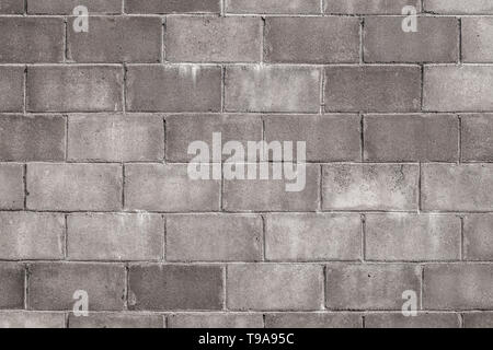 Old concrete blocks wall texture background. Unfinished rustic.decoration.loft idea background. Stock Photo