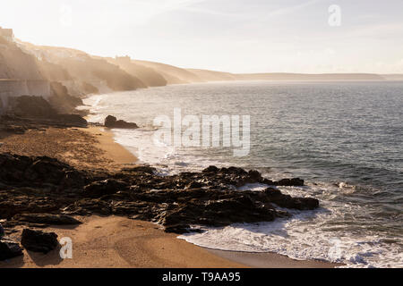 Morning mist on the cliffs along Porthleven Sands in Cornwall, England, UK. Stock Photo