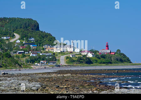 Village of La Martre with church and lighthouse, La Martre, Quebec, Canada Stock Photo