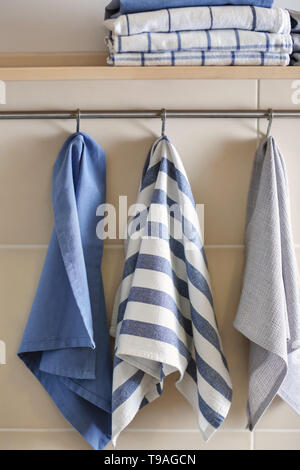 Different Clean Towels Hanging Rack Kitchen Stock Photo by ©NewAfrica  599502714