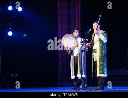 Beijing, China. 17th May, 2019. Artists from Tajikistan sing a folk song during a performance in Beijing, capital of China, May 17, 2019. Credit: Li He/Xinhua/Alamy Live News Stock Photo