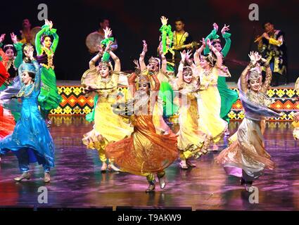 Beijing, China. 17th May, 2019. Artists from Tajikistan dance during a performance in Beijing, capital of China, May 17, 2019. Credit: Li He/Xinhua/Alamy Live News Stock Photo