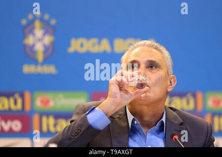 Rio De Janeiro, Brazil. 17th May, 2019. Brazilian's coach Tite drinks water during a press conference to announce the list of the 23 players for the Copa America 2019 at the headquarter of CBF (Brazilian Football Confederation) in Rio de Janeiro, RJ, Brazil, on May 17, 2019. The tournament will be held from June 14 to July 7 in five cities in Brazil. Credit: Li Ming/Xinhua/Alamy Live News Stock Photo