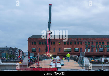 Cork City, Cork, Ireland. 17th May, 2019. The new Mary Elmes Bridge now in place after been lifted into position overnight by cranes between Patrick's and Merchant's Quays in Cork City, Ireland. Credit David Creedon / Alamy Live News Stock Photo