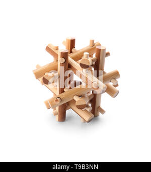 Wooden puzzle on white background Stock Photo