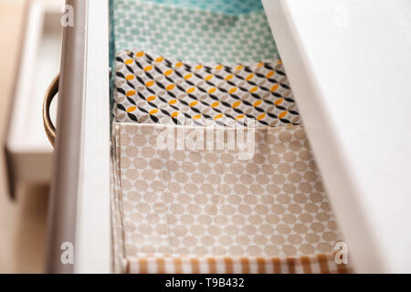 Clean kitchen towels in drawer Stock Photo