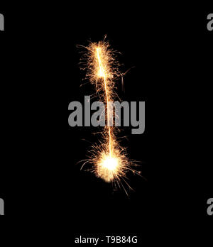 Sparklers forming letter I on dark background Stock Photo