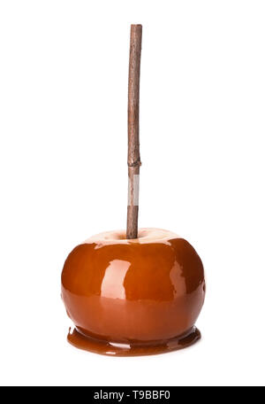 Delicious caramel apple with tree branch on white background Stock Photo