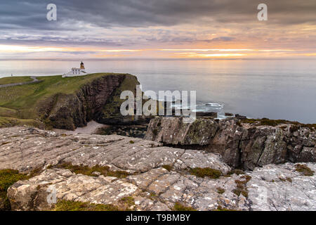 Sunset over the Stoer Lighthouse in Scotland Stock Photo