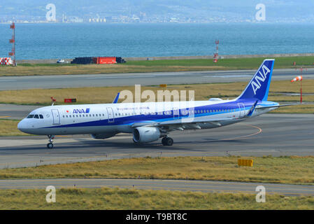 Osaka, Japan - Apr 19, 2019. JA111A All Nippon Airways Airbus A321 taxiing on runway of Kansai Airport (KIX). Stock Photo