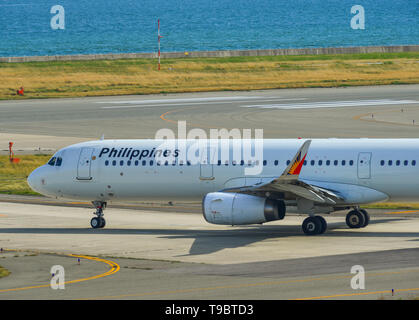 Osaka, Japan - Apr 19, 2019. Philippine Airlines RP-C9914 (Airbus A321) taxiing on runway of Kansai Airport (KIX). Stock Photo