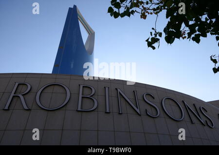 RIYADH, SAUDI ARABIA - DECEMBER 18, 2018: Side view of the Kingdom Centre by day with the advertising label Robinsons Stock Photo
