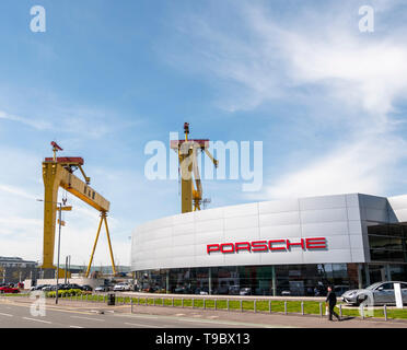 Porsche dealership, Titanic Quarter with Harland and Wolff cranes Samson and Goliath in background Stock Photo