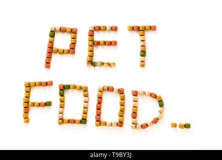 letters from dry pet food isolated on white background Stock Photo