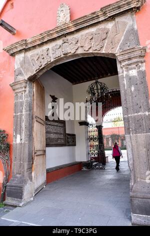 Stone entrance to the historic Hacienda Galindo, a 16th century estate once owned by the Spanish Conquistador Hernando Cortes, in San Juan del Rio, Queretaro, Mexico. The hacienda is now a hotel and resort owned and operated by Fiesta Americana. Stock Photo