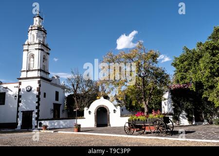 Private chapel and courtyard at the historic Hacienda Galindo, a 16th century estate once owned by the Spanish Conquistador Hernando Cortes, in San Juan del Rio, Queretaro, Mexico. The hacienda is now a hotel and resort owned and operated by Fiesta Americana. Stock Photo