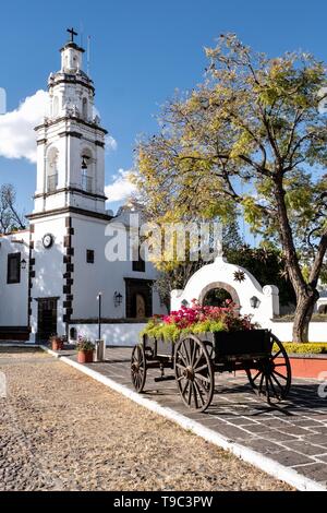 Private chapel and courtyard at the historic Hacienda Galindo, a 16th century estate once owned by the Spanish Conquistador Hernando Cortes, in San Juan del Rio, Queretaro, Mexico. The hacienda is now a hotel and resort owned and operated by Fiesta Americana. Stock Photo