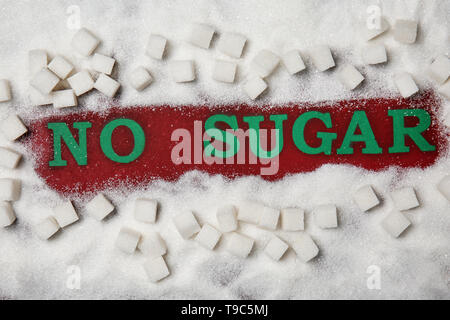 Composition with phrase NO SUGAR on color background Stock Photo
