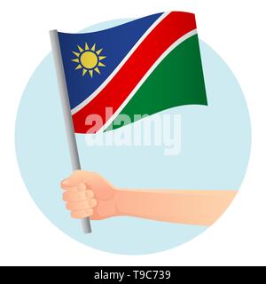 Namibia flag in hand. Patriotic background. National flag of Namibia  illustration Stock Photo