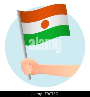 Niger flag in hand. Patriotic background. National flag of Niger  illustration Stock Photo